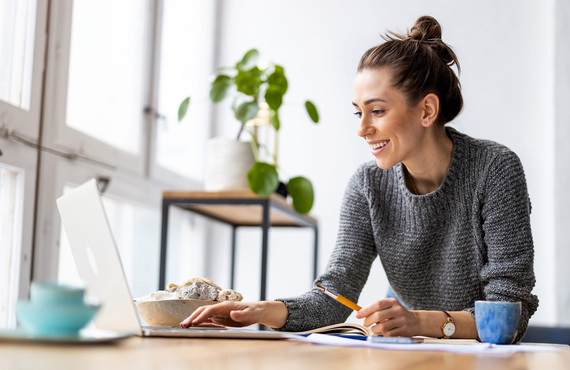 corporation-domain-registration-woman-working-on-her-laptop